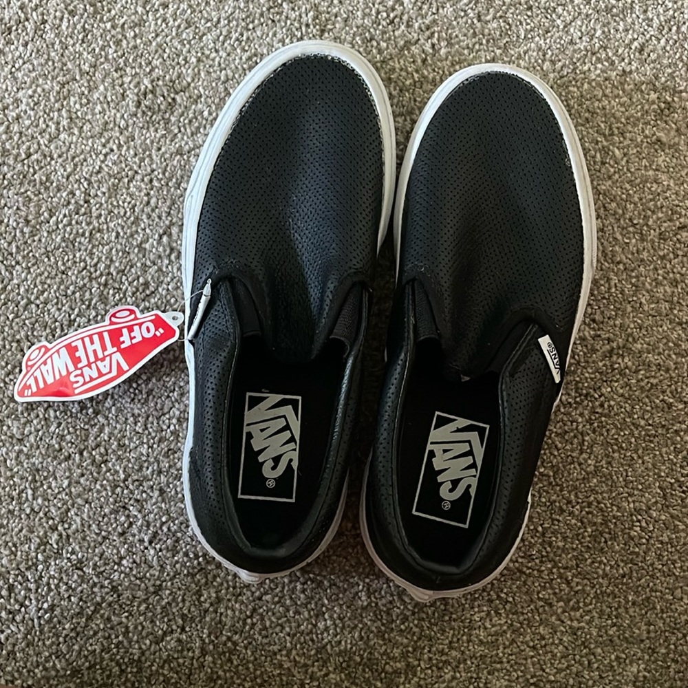 Brand new. Black leather vans